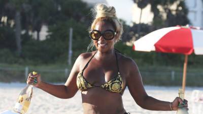 Mary J. Blige, 50, Looks Amazing In Versace Bikini Enjoying Wine On The Beach — Photos - hollywoodlife.com