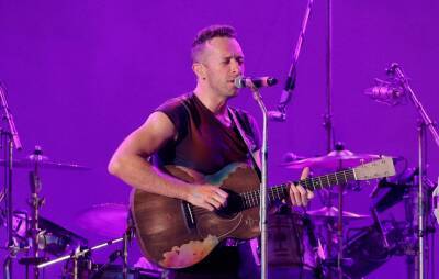 Coldplay cancel two performances due to positive COVID tests - www.nme.com - London - Germany