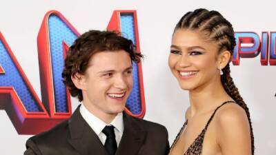 Zendaya Stops Tom Holland in His Tracks When She Shows Up to 'Spider-Man' Premiere (Exclusive) - www.etonline.com - Los Angeles - city Holland