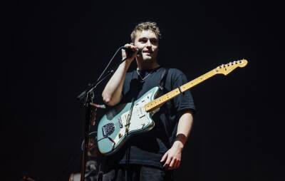 Sam Fender postpones in-store shows after crew member contracts COVID - www.nme.com - Britain - city Sheffield