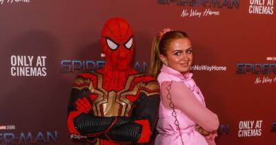 EastEnders’ Maisie Smith turns heads in pink outfit and earmuffs as she poses with Spider-Man - www.ok.co.uk