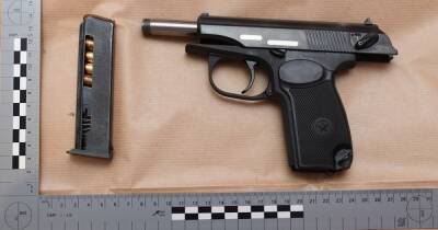 Man arrested after police investigating child exploitation find loaded gun during raid - www.manchestereveningnews.co.uk