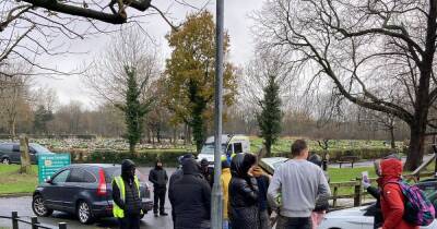 Footage shows grieving relatives dragged from cemetery as council workers remove headstone tributes - www.manchestereveningnews.co.uk - Manchester