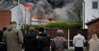 'My mum's whole life was in that place': Homes evacuated at huge warehouse blaze destroys storage units - now under control - www.manchestereveningnews.co.uk - county Denton