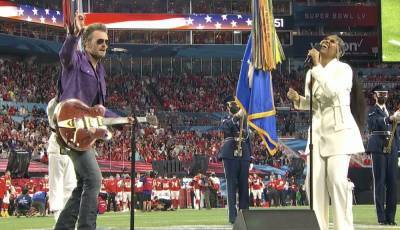 Watch Eric Church and Jazmine Sullivan’s Soulful, Syncopated Super Bowl National Anthem; H.E.R. Shreds on ‘America the Beautiful’ - variety.com - France - county Banner