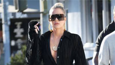Khloe Kardashian Pulls Down Her Boyfriend Jeans To Reveal String Bikini In Sexy New Pic - hollywoodlife.com - USA