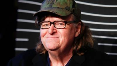Michael Moore speaks out against Texans over Gov. Abbott's decision to reopen the state amid the coronavirus - www.foxnews.com - Texas