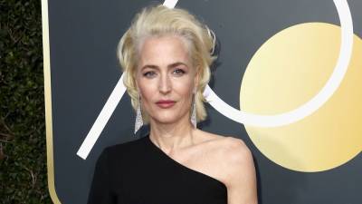 Why Gillian Anderson Has an American and British Accent - www.etonline.com - Britain - USA - Chicago - Michigan