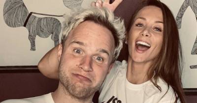Olly Murs urged to propose to girlfriend Amelia Tank as he celebrates one year of living together with adorable video - www.ok.co.uk
