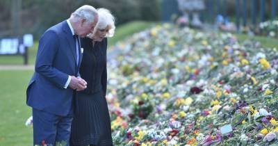 Prince Charles and Camilla make emotional visit to look at flowers and tributes left for Prince Philip - www.ok.co.uk