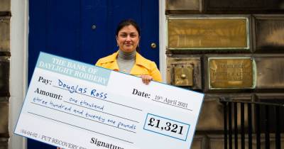 Douglas Ross mocked over personal tax cut as giant £1300 cheque delivered to his door - www.dailyrecord.co.uk - Scotland - county Ross - county Douglas