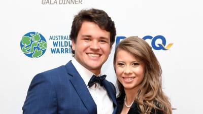 Bindi Irwin and Chandler Powell Marvel Over '2 Weeks of Happiness' With Baby Girl Grace - www.etonline.com