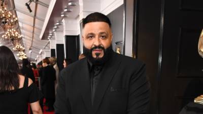 DJ Khaled Explains Why Kanye West Was Wearing His Wedding Ring in Studio Pic (Exclusive) - www.etonline.com