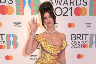 BRIT Awards 2021: Dua Lipa, Billy Porter and Haim among the best dressed stars on the red carpet - www.msn.com
