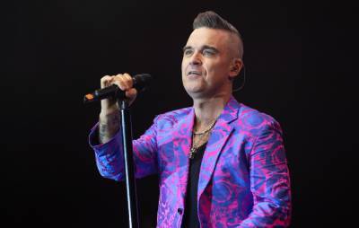 Robbie Williams biopic ‘Better Man’ will give his songs the ‘Rocketman’ treatment - www.nme.com