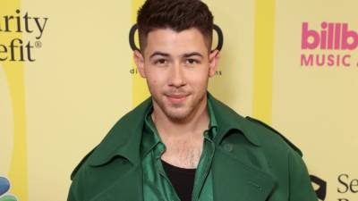 Nick Jonas Goes Bold in Green for 2021 Billboard Music Awards Red Carpet - www.etonline.com - Los Angeles