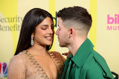 Nick Jonas and Priyanka Chopra get cozy on the 2021 BBMAs red carpet - nypost.com - London - Los Angeles