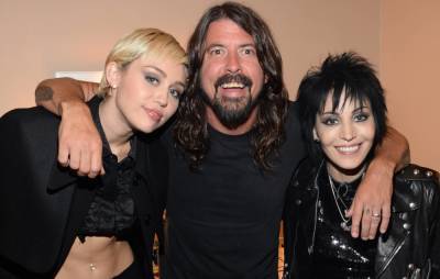 Dave Grohl on the time he got high with Joan Jett and Miley Cyrus: “I was tripping balls!” - www.nme.com