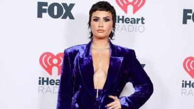 Demi Lovato Stuns In Purple Velvet Pantsuit at 2021 iHeartRadio Music Awards - www.etonline.com - Los Angeles