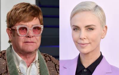 Elton John and Charlize Theron ask Boris Johnson to help with fight against AIDs - www.nme.com - Britain