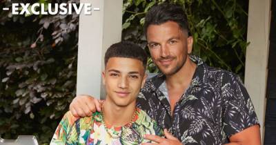 Junior Andre looks back at dad Peter’s most iconic looks – EXCLUSIVE VIDEO - www.ok.co.uk