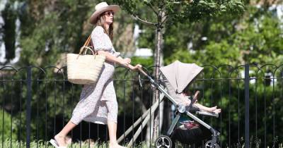Millie Mackintosh flaunts blossoming baby bump in floral dress on sunny stroll - www.ok.co.uk - London - Taylor - Chelsea