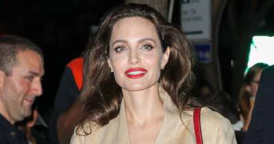 Angelina Jolie back in touch with Jonny Lee Miller - www.msn.com