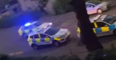 Two men rushed to hospital and two arrested after 'disturbance' in Edinburgh flat - www.dailyrecord.co.uk