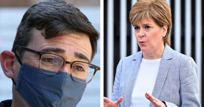 Andy Burnham and Nicola Sturgeon trade heated words as row over Manchester-Scotland travel ban intensifies - www.manchestereveningnews.co.uk - Scotland - Manchester