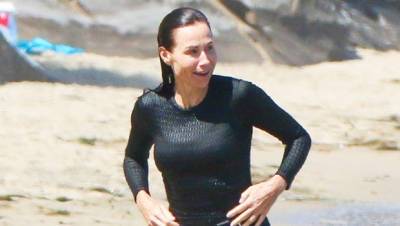 Minnie Driver, 51, Stuns In Black Swimsuit While Taking A Swim At The Beach - hollywoodlife.com - Malibu