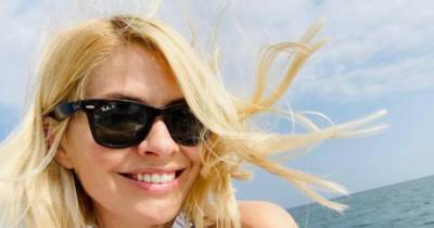 Holly Willoughby proves why every lady needs this flattering piece of swimwear - www.ok.co.uk