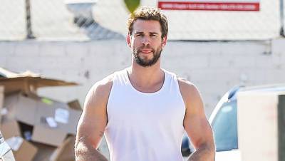Liam Hemsworth Is Smoldering In White Tank Top At Photoshoot For ‘Men’s Health’ — See Pics - hollywoodlife.com - Australia