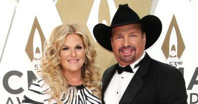 Trisha Yearwood Gushes Over Garth Brooks Proposal 16 Years After He Popped the Question: I Was ‘Freaking Out on Stage’ - www.usmagazine.com