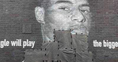 Police investigating after Marcus Rashford mural vandalised by racists after Euro 2020 defeat as community slam vandals - www.manchestereveningnews.co.uk - Italy - Manchester