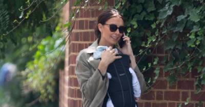 Christine Lampard looks effortlessly stylish as she cradles baby son Freddie on walk - www.ok.co.uk - London