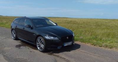 Luxury Jaguar torched in Scots driveway as cops launch probe - www.dailyrecord.co.uk - Scotland - county Norman