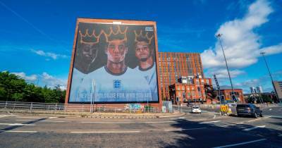 Huge digital mural of Rashford, Sancho and Saka unveiled after the England stars were targeted with racist abuse - www.manchestereveningnews.co.uk - Italy - Sancho