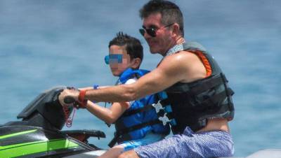 Simon Cowell, 61, Rides Jet Ski With Son Eric, 7, Just 1 Year After Breaking His Back — Photos - hollywoodlife.com - Britain - Barbados