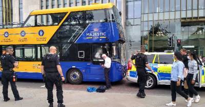 Cop car 'carrying armed officers' collides with tourist bus in Edinburgh city centre - www.dailyrecord.co.uk - Scotland - city Edinburgh