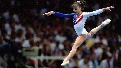 Dominique Moceanu Reflects on Her Injury at 1996 Olympics in Support of Fellow Gymnast Simone Biles - www.etonline.com - USA - Tokyo