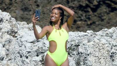 Gabrielle Union, 48, Glows In Cheeky White Swimsuit: ‘Cheers To The Weekend’ — Photos - hollywoodlife.com