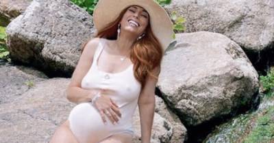 Pregnant Stacey Solomon glows in gorgeous beach photo as she cradles baby bump - www.ok.co.uk