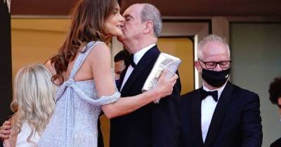 Cannes film festival president breaks Covid kissing rule on first red carpet - www.msn.com - France