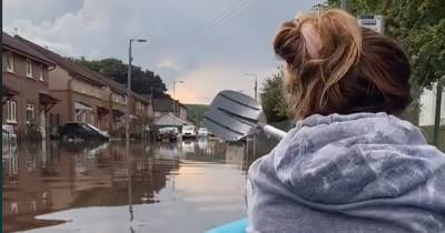 Scots pals row dingy through street after Glasgow flash floods - www.dailyrecord.co.uk - Scotland