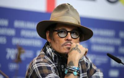 Spanish female filmmakers condemn festival award for Johnny Depp - www.nme.com - Spain