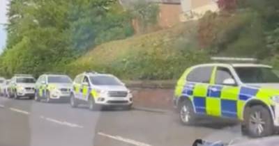 Dramatic footage as cops swarm Fife street amid drugs raid at two properties - www.dailyrecord.co.uk - Scotland