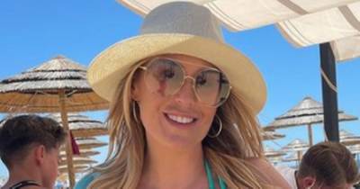 Kate Ferdinand stuns in a blue bikini as she shares throwback holiday snaps with son Cree and husband Rio - www.ok.co.uk