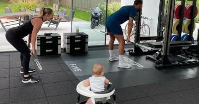 Kate Ferdinand shares rare photo of son Cree as he watches his parents work out in home gym - www.ok.co.uk