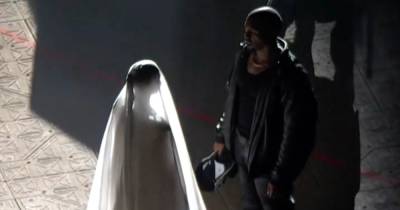 Kim Kardashian wears wedding gown and Kanye West 'sets himself' on fire at his album party - www.ok.co.uk - Chicago