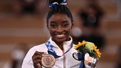 Simone Biles Says Her Bronze Olympic Medal 'Means More Than All of the Golds' - www.etonline.com - Tokyo